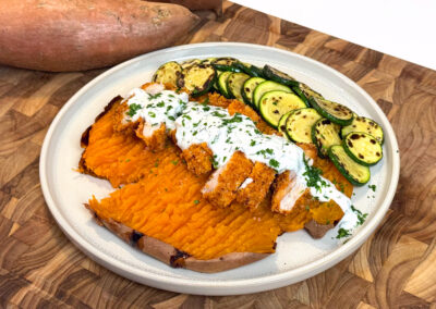 Stuffed Sweetpotato with Crispy Chicken & Roasted Garlic Yoghurt Sauce